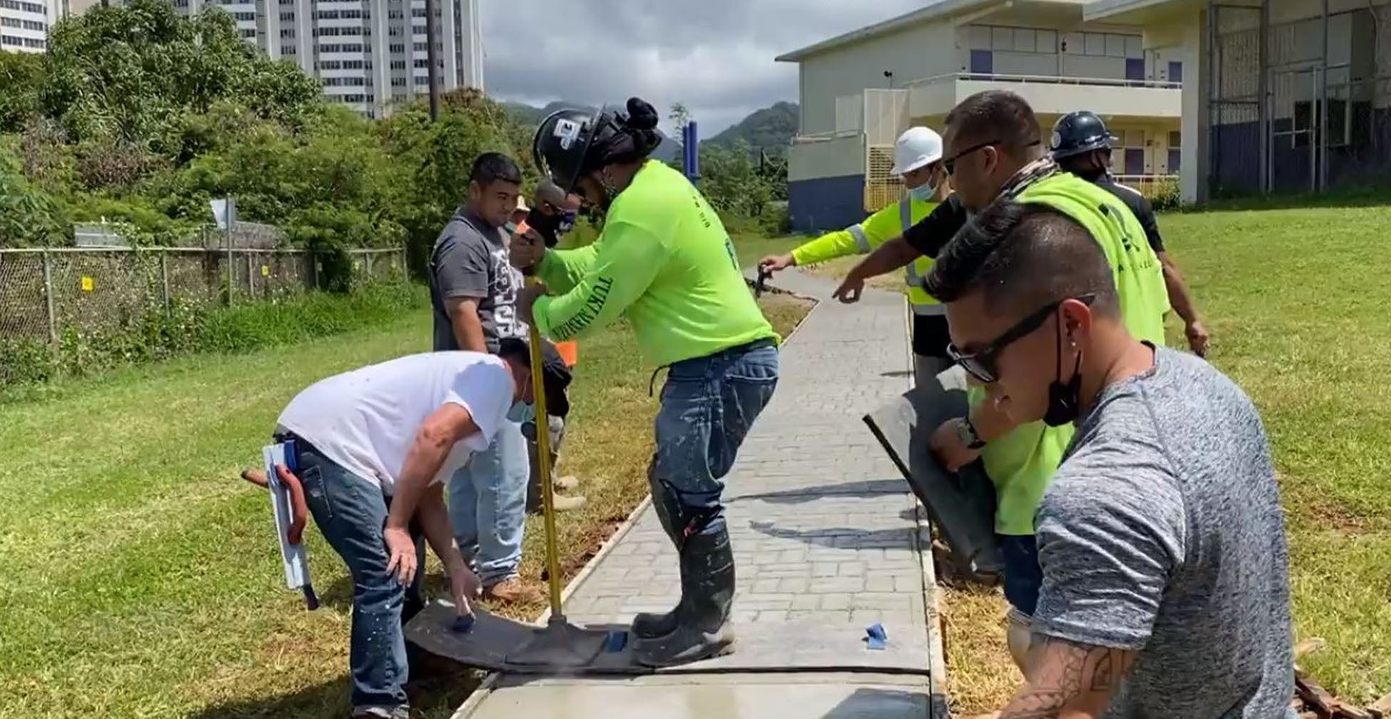 BAC Local 1 Hawaii apprentices build a 250-foot-long walkway to help students safely walk to and from school.