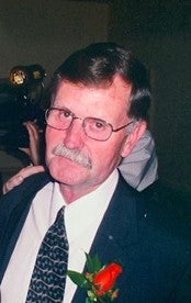 Eldon L. Mills