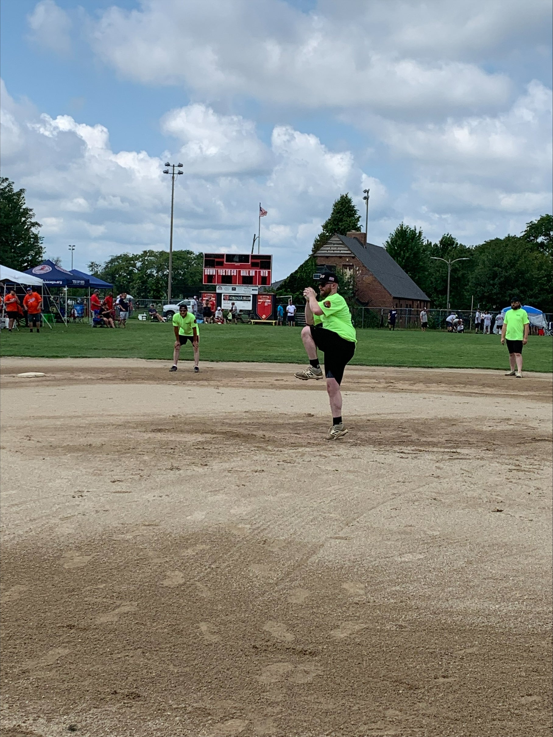 ADC 1 of IL team in action. Pictured is Local 21 member and pitcher Dan McHale, Local 21 member Joe Voss on 3rd base, and Local 74 IL member and shortstop Jordan Perz