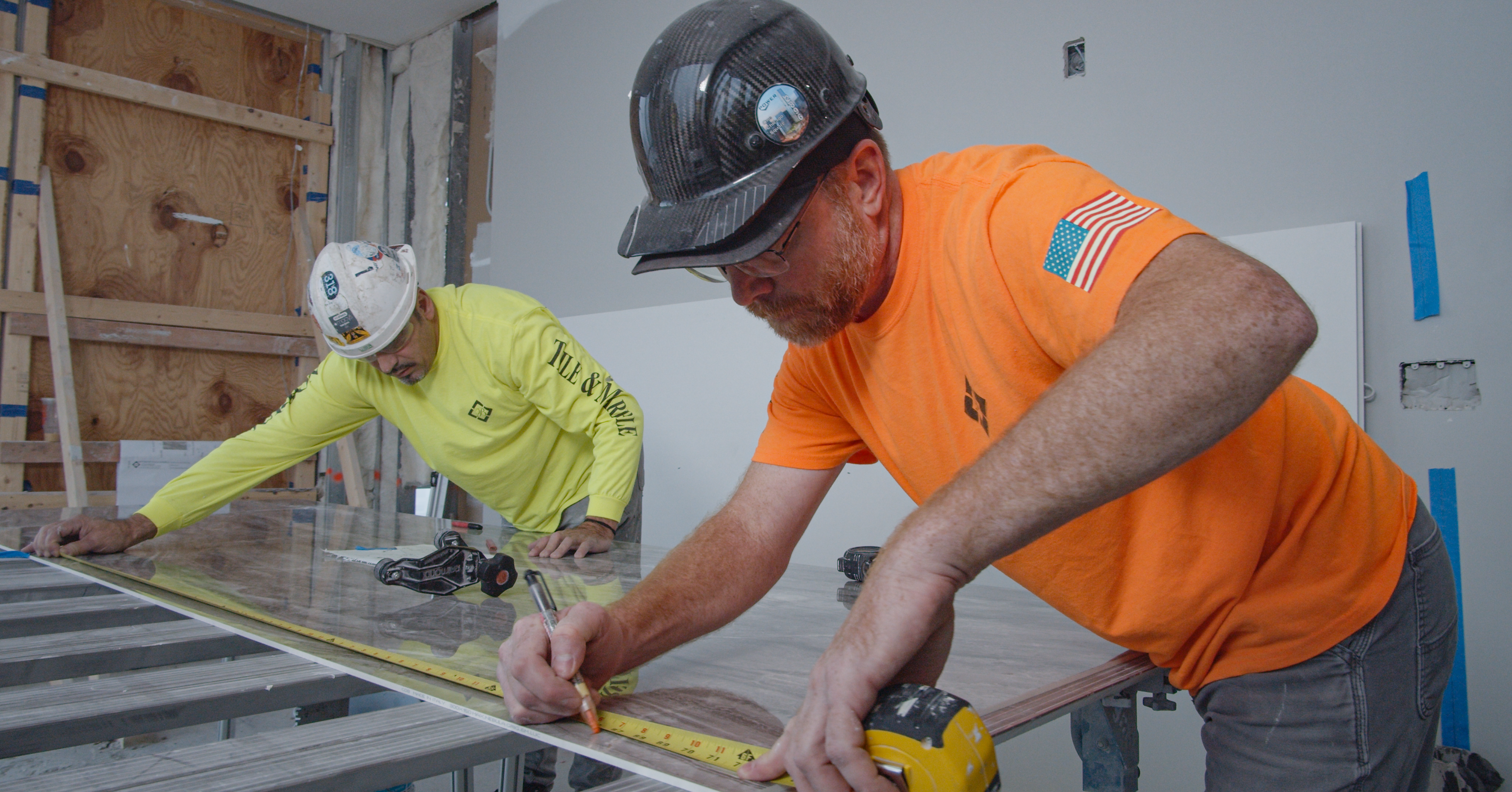 From left, BAC Local 21 IL Tile Setters Pierluigi Luzzi and Alexander Vodicka. 