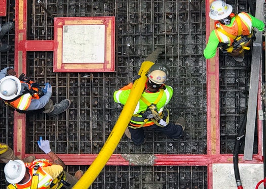 Members pouring concrete on the jobsite. Photo: Southern Company